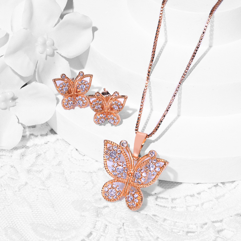 Nuevas opciones transfronterizas de diseño de moda de cobre de zinc pendientes de piedra collar conjunto de joyas pendientes de joyas de mujer