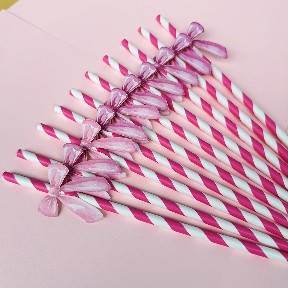 Suministros para fiestas transfronterizas Pajitas de lazo creativas Pajitas de papel desechables Pajitas de jugo de frutas Spot al por mayor