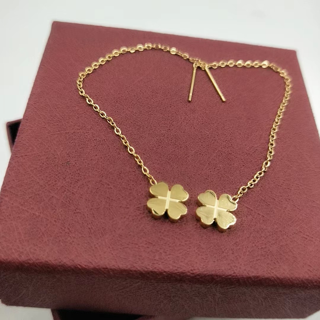 Explosions Lucky Grass Titanium Steel Ear Line Women's 18K Gold Plating Cold Wind Personality Earrings Four-leaf Flower Elegant Long Earrings