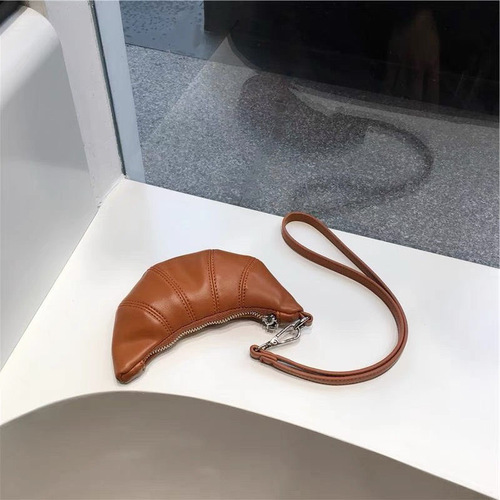 Wholesale cross-border French niche design texture soft leather mini croissant retro exquisite hand-held lanyard zero