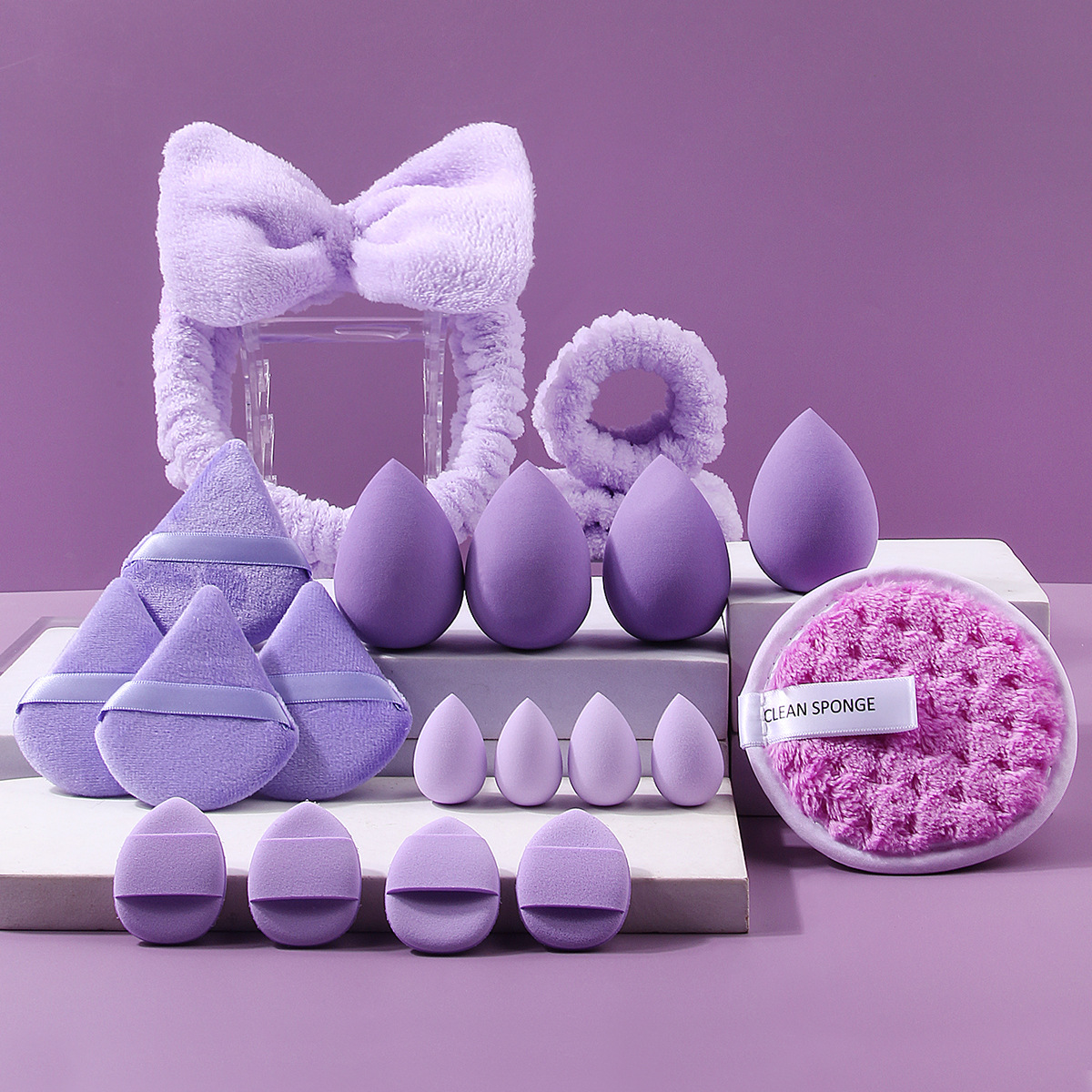 Explosiones transfronterizas desmaquillaje triángulo pulgar polvo conjunto correa de cabello combinación de huevo de maquillaje lavado de la cara esponja absorción correa de muñeca