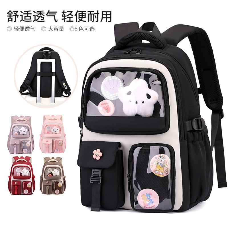 Mochila de pescado natural para estudiantes de escuela primaria 3 - 6 grados de protección de cresta para reducir la carga de estudiantes de secundaria de gran capacidad de moda mochila versátil