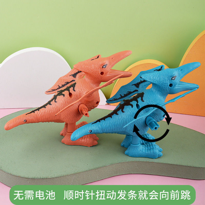 Juguete nostálgico de los niños simulación animal salto dinosaurio puesto en el mercado nocturno regalo suministro al por mayor