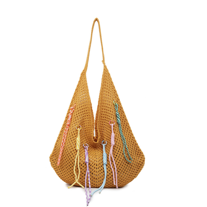 Versión coreana del bolso de nicho 2025 verano nuevo bolso de hombro de punto hueco bolso de mensajero de gran capacidad mujer