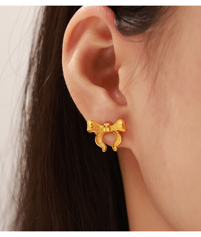 Set de joyería para mujer con colgante de lazo en acero_voghion.com