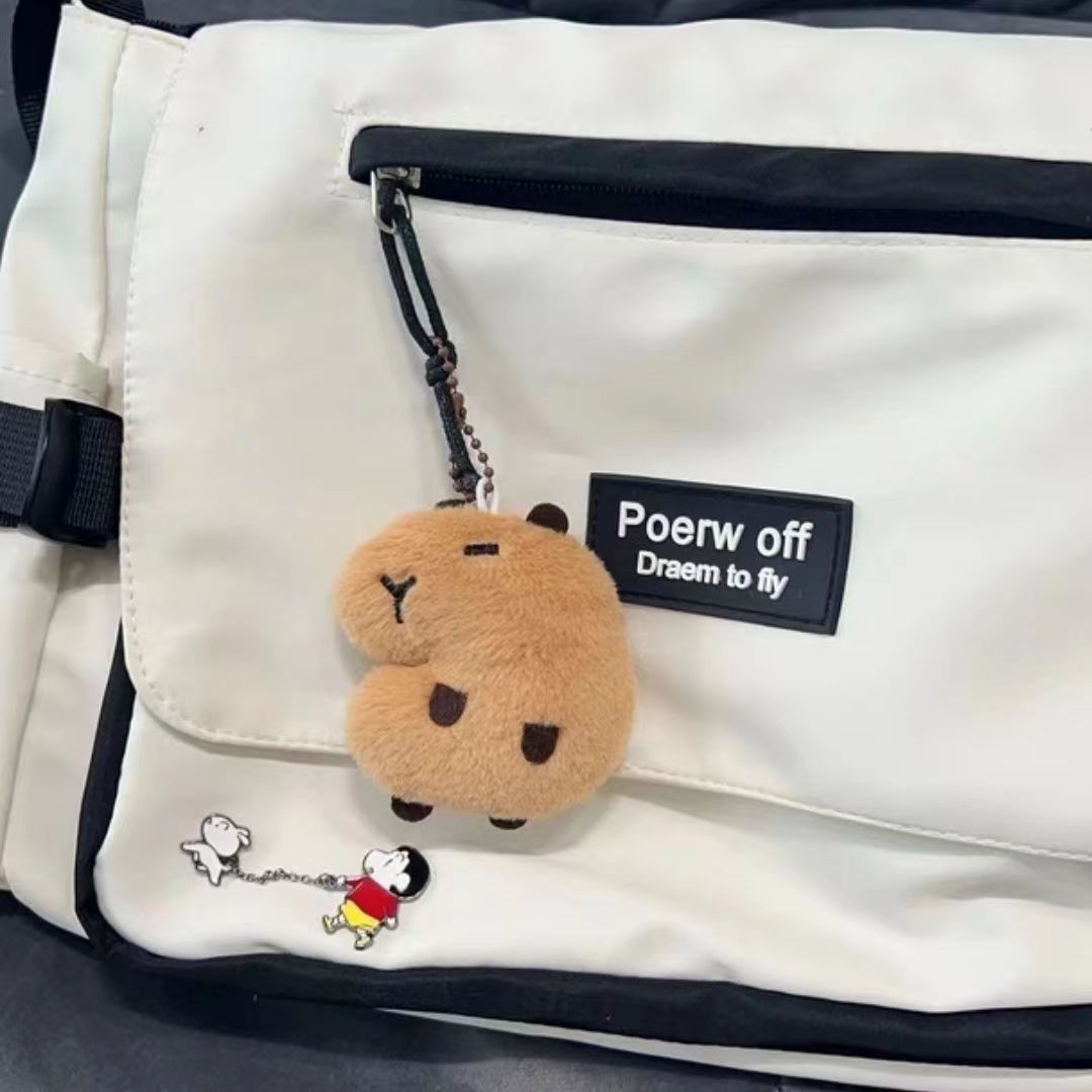 Linda muñeca de dibujos animados colgando cadena agua guinea pig llavero