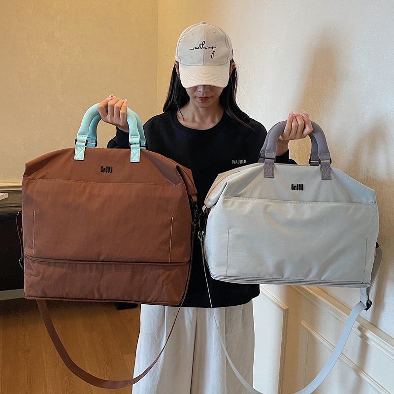 Wholesale sports and fitness bags, expandable, large capacity, lightweight, multi-compartment, multi-functional business trip bags, hand-held, crossbody, and travel bags.