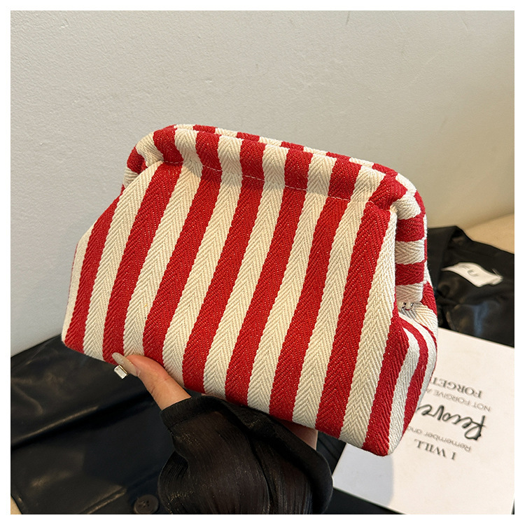 New cross-border fashion color-blocking striped cosmetic bag, women's loose change mobile phone storage bag, trendy and niche cloud clutch undefined