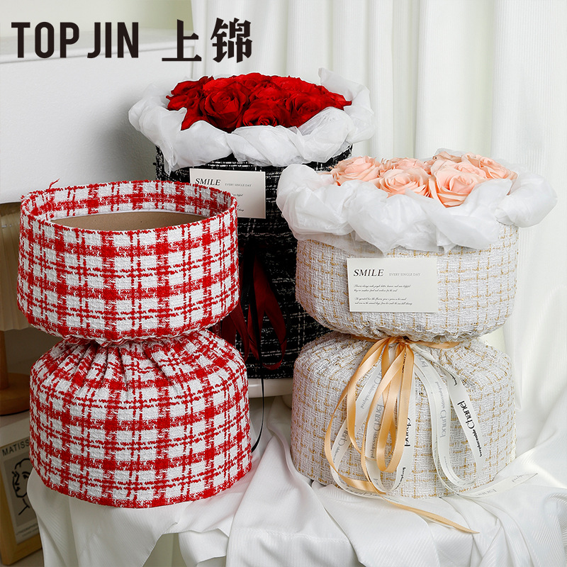 Material de embalaje de flores al por mayor nuevo estilo Chanel de una sola pieza que forma pieza redonda ramo bolsa de tela flor artefacto