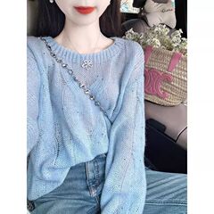 青いキラキラ長袖の透かし彫りの柔らかいモチモチのプルオーバーのセーターの女性の春のゆったりしている怠惰な風の高級感のニットの上着