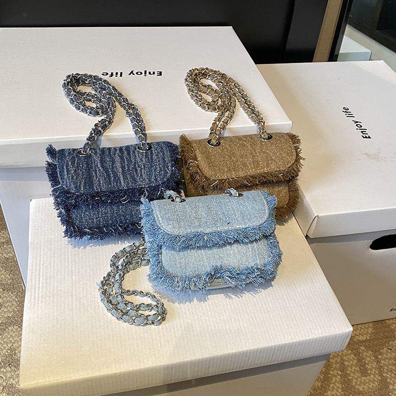 Bolso de hombro de moda para niños y niñas con bordes sin rebaby versión coreana de estilo occidental mini bolso de mensajero para bebés otoño e invierno nuevo bolso de cadena para niños