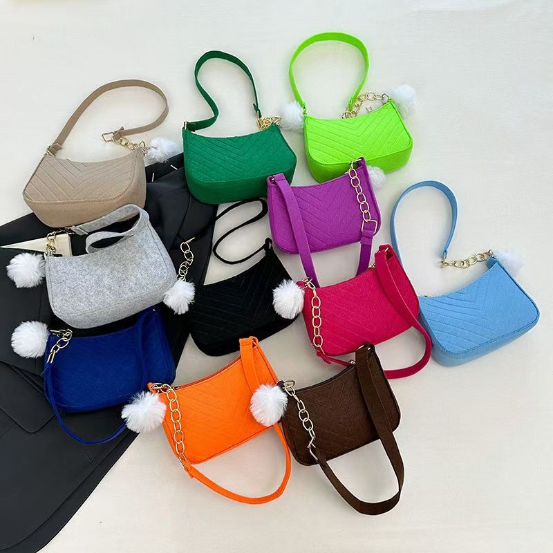 Solid Color Pom-Pom Women's Bag 2025 Winter New Style Fresh Felt Underarm Bag with Indentation, Fashionable Single-Shoulder Trendy Small Square Bag Solid Color Pom-Pom Women's Bag 2025 Winter New Style Fresh Felt Underarm Bag with Indentation, Fashionable Single-Shoulder Trendy Small Square Bag