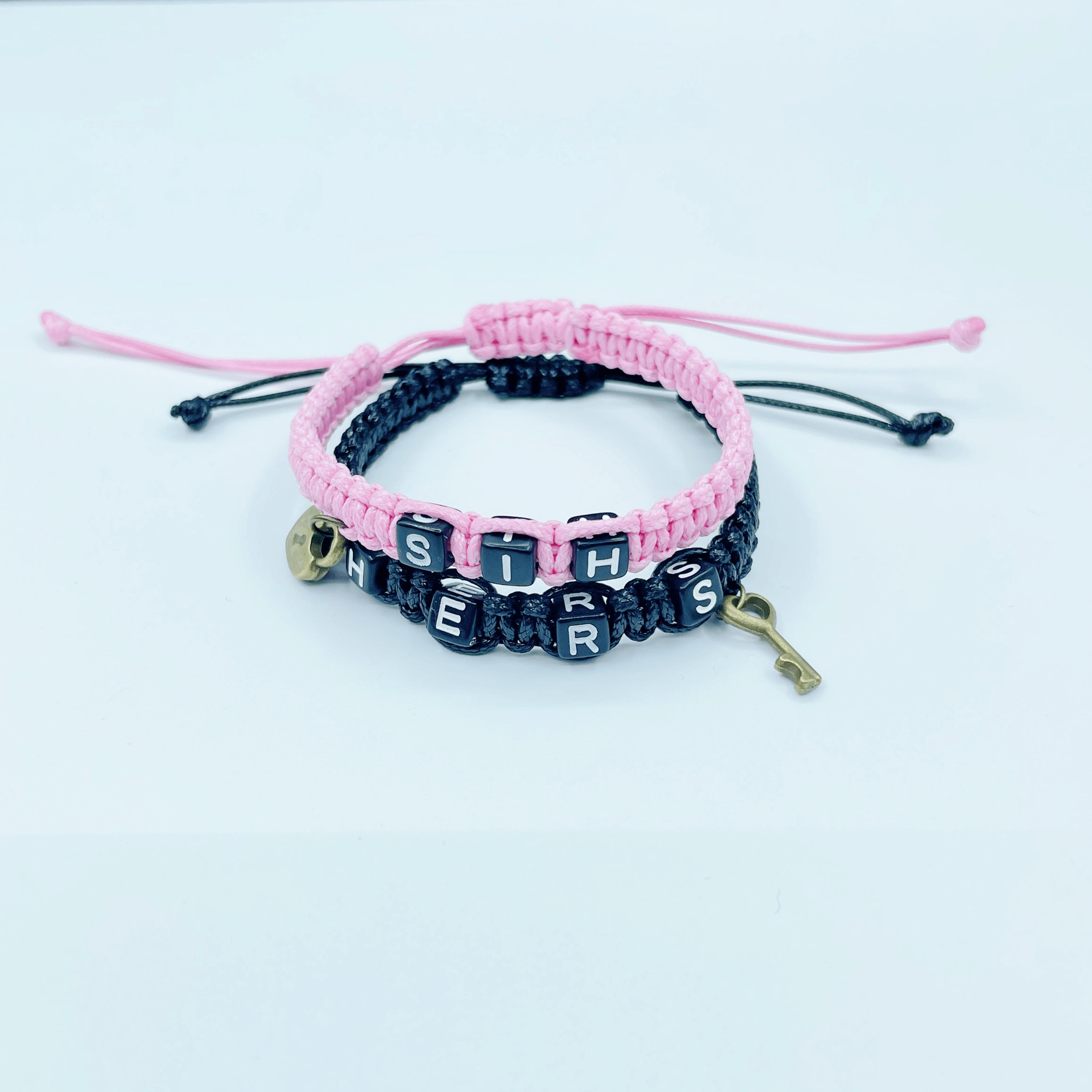 Venta caliente europea y americana su HERS pareja pulsera cerradura núcleo clave colgante tejido cordón pulsera transfronteriza joyería al por mayor