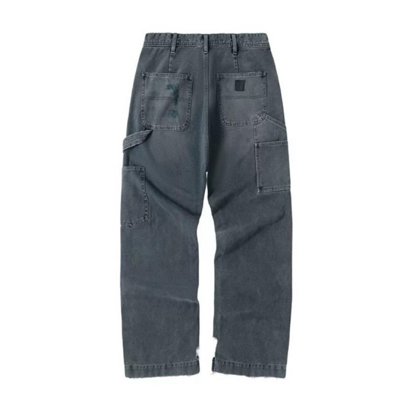 Jeans uomo loose gamba dritta lavaggio denim con strappi_voghion.com