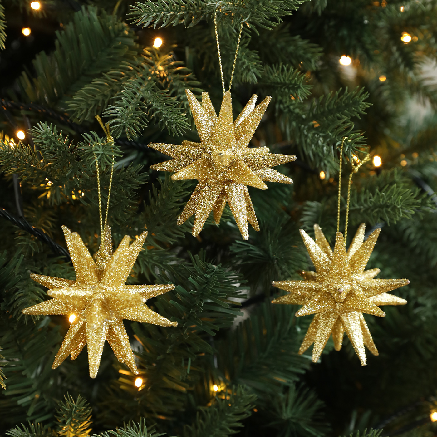 Nuevos colgantes creativos de Navidad transfronterizos polvo de oro explosivo estrella tridimensional árbol de Navidad decoración diseño de colgante