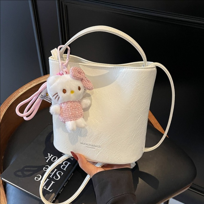 Bolso de cubo de viajero de gran capacidad simple de moda de moda para mujer 2025 nuevo bolso de mensajero de hombro casual de color sólido popular