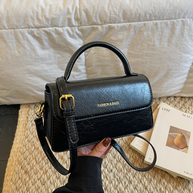Textura de nicho simple bolso cuadrado para mujeres 2025, nuevo tipo de mochila portátil negra simple bolso de hombro de viaje diario image 1