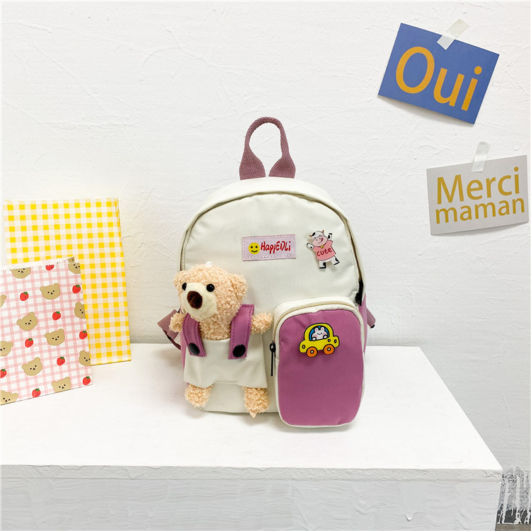 Großhandel Cartoon Kollidierende Farbe Bär Puppe Rucksack Nihaojewelry display picture 1
