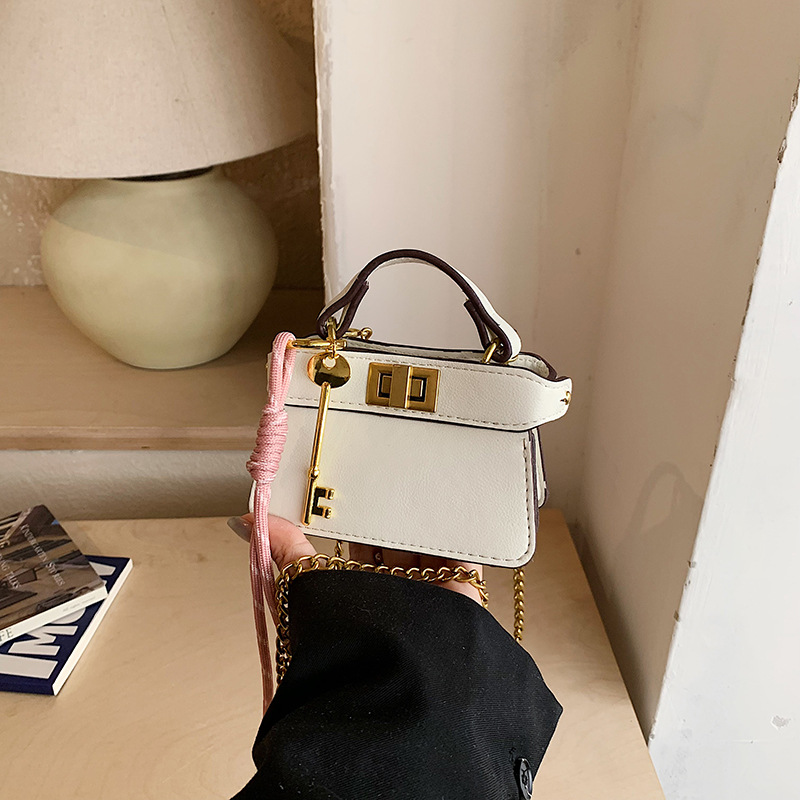 Coreano simple bolso de niña de color sólido mini bolso de bebé 2026 bolso para niños de comercio exterior transfronterizo