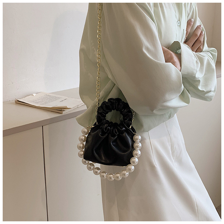 255g Weight Beading, Pearls Fashion Element Clasp Frame Closure Type Top Handle, Chain Strap Type Crossbody Bag Bags Type Casual, Daily, Shopping Occasion Pu Leather Material Solid Color Pattern All Seasons Season Kid'S Gender Cute Style Bucket Shape Kid'S Pu Leather Solid Color Cute Beading Pearls Bucket Clasp Frame Crossbody Bag 37