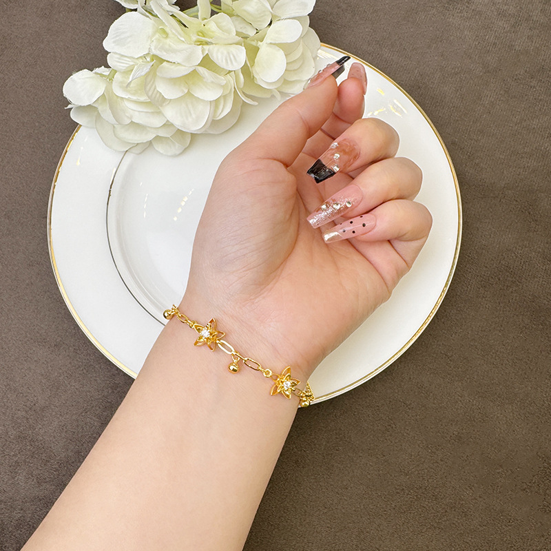 Nueva pulsera de oro antiguo estilo chino lujoso ligero de piedra hueca flor brazalete de joyería de mano de nicho femenino de alta calidad