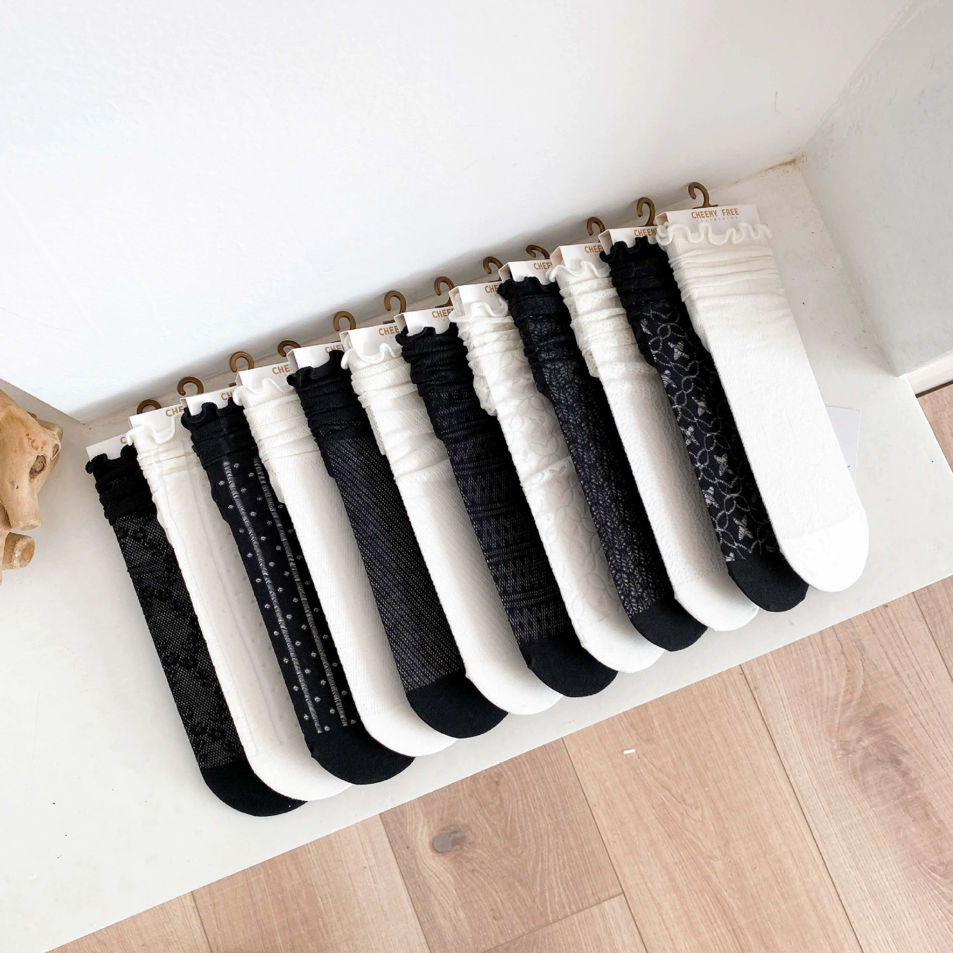 Socks in summer net eye hollow and breathable women's middle stockings college wind black and white jk socks Japanese wood ear pile pile of socks