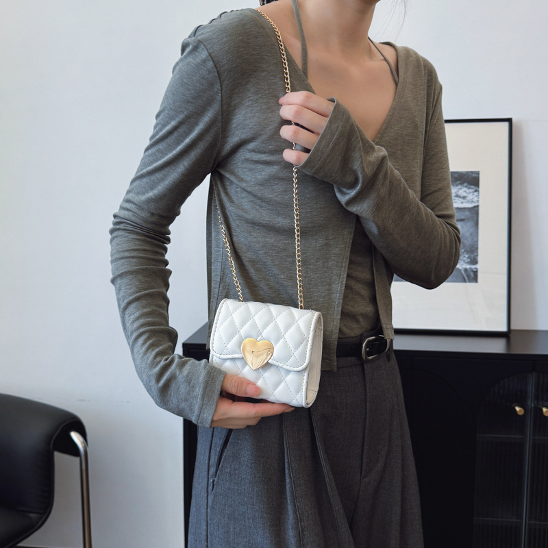 Versión coreana del bolso de hombro para niña con fragancia pequeña dulce amor estilo occidental Lingge baby bandolera nuevo bolso de cadena para niños