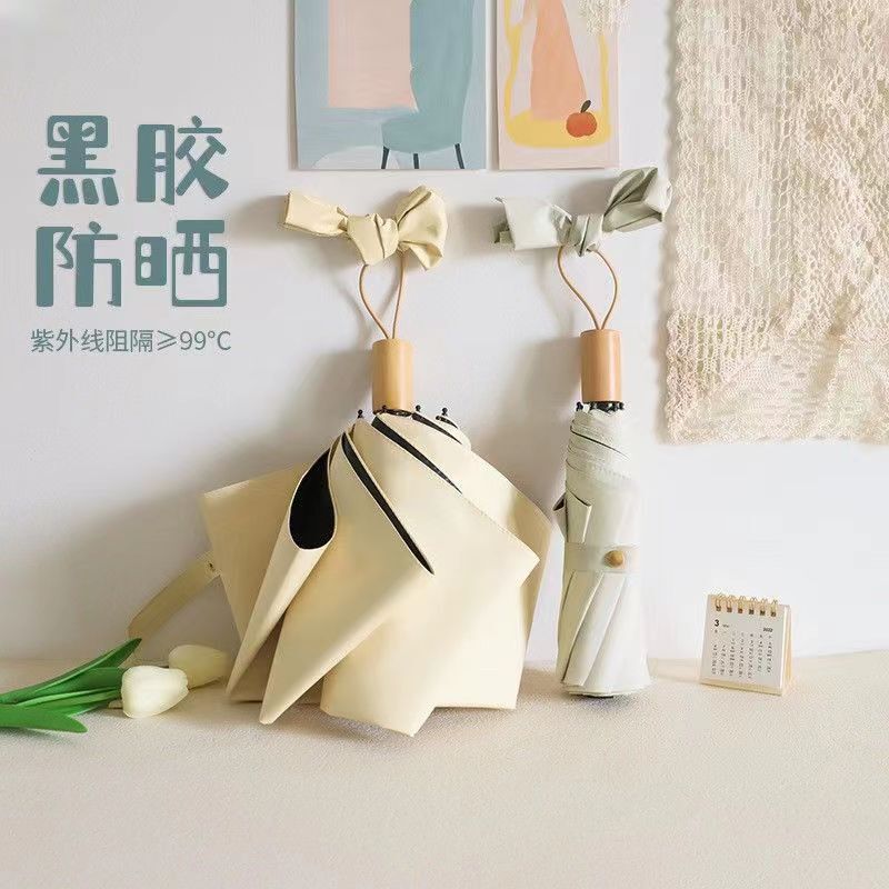 Folding black plastic solid wood handle three-fold men's and women's all-weather umbrella small fresh fashion sun umbrella simple high-looking umbrella