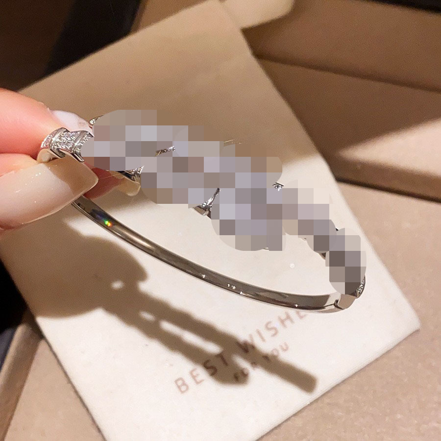 El temperamento francés arco de zircon pulsera de doble capa dulce ins pulsera de viento lujoso ligero de alto nivel sensación de joyas versátiles para mujeres