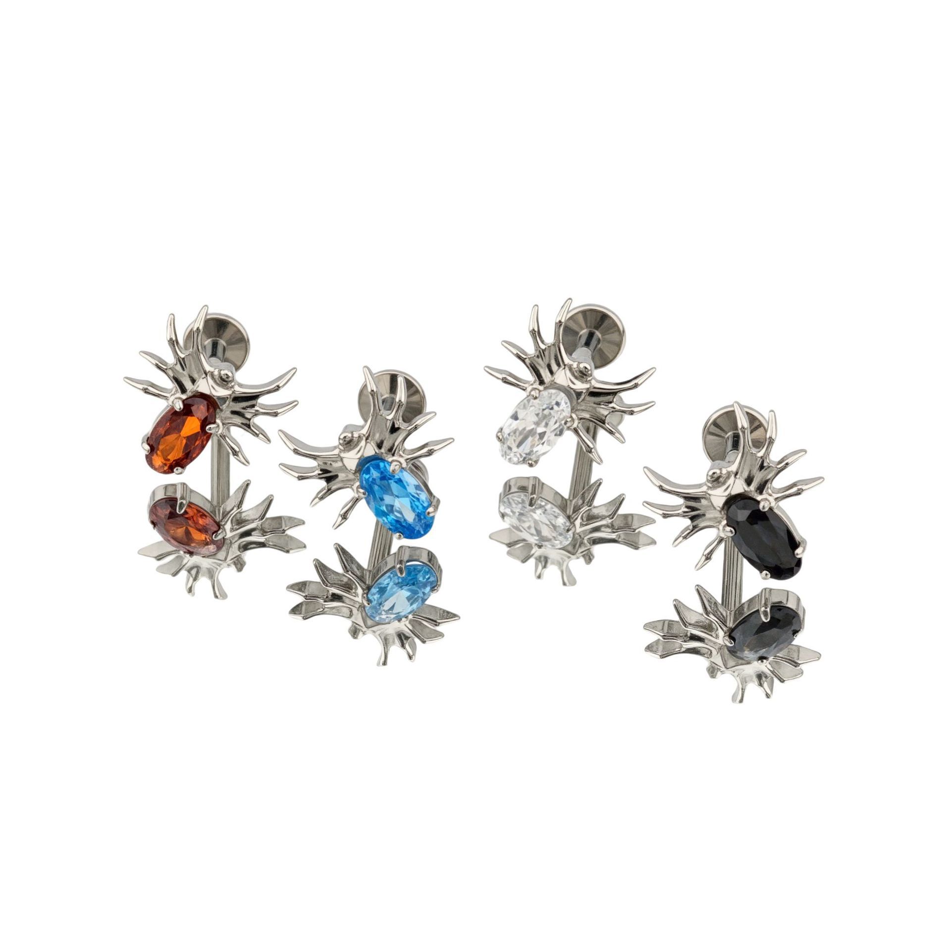 Silver pointed spike labret stud material detail