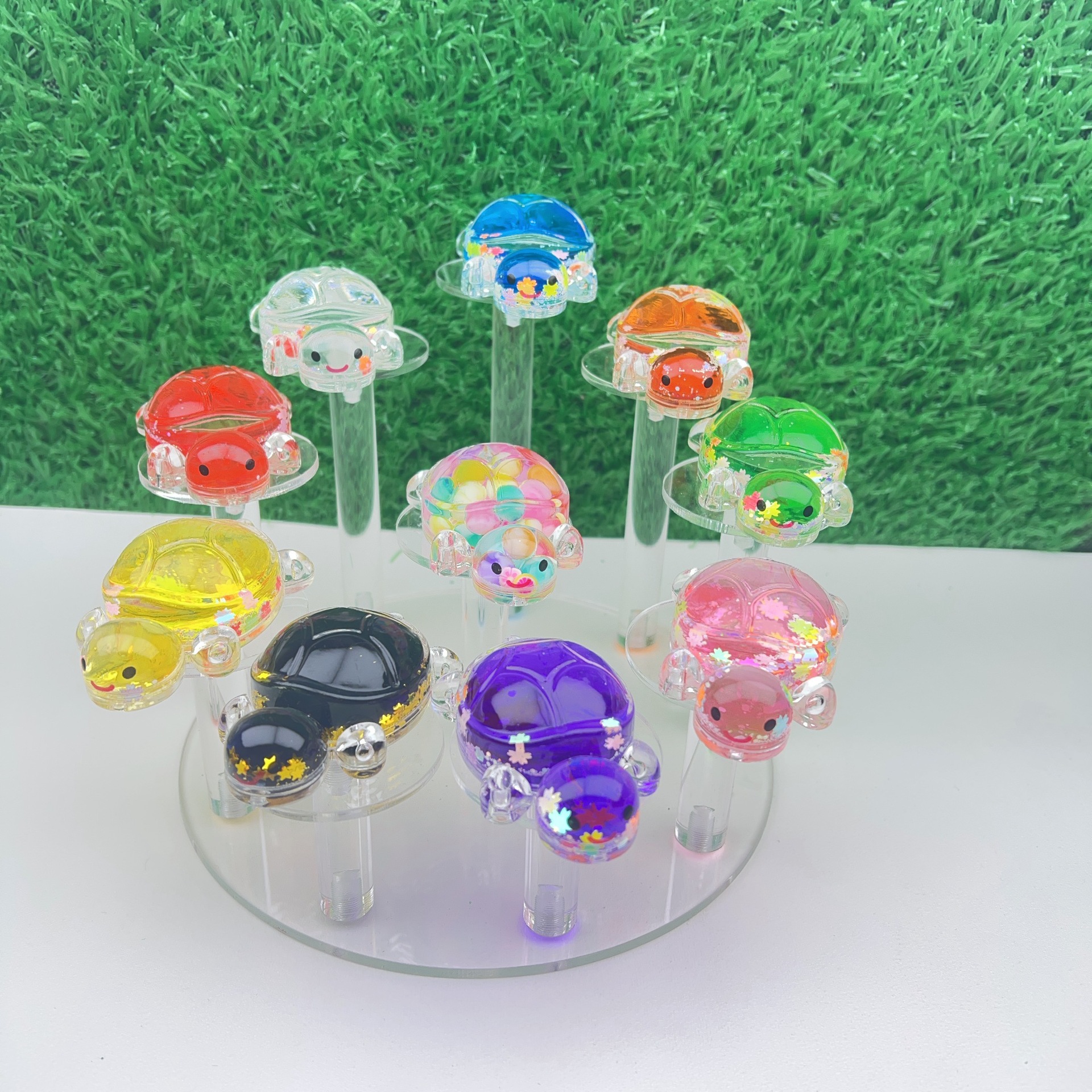 Chatter en vivo explosión de joyería DIY arena flotante en aceite explosión tortuga llavero bolso de teléfono móvil colgante decoración de escritorio