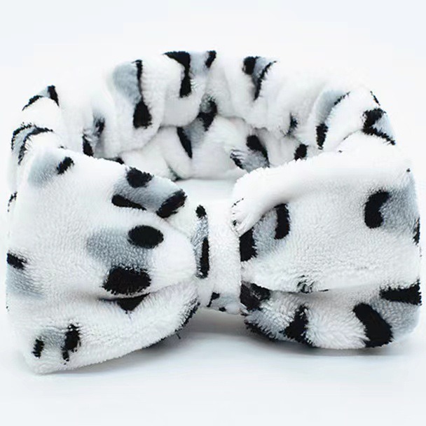 Europa y América leopardo punto ondulado coral veludo correa de cabello mariposa final correa de cabello lavado facial maquillaje turbante fábrica de cabello al por mayor