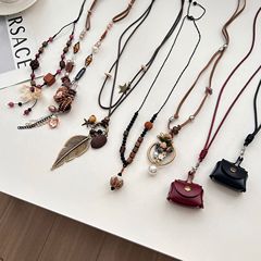 新しい中国風のレトロなエスニックスタイルの花ペンダントロングネックレス女性の鎖骨チェーンニッチデザインセーターチェーンアクセサリー
