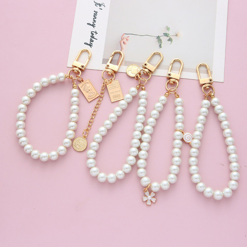Retro trendy brand pearl key chain wholesale antique simple small pendant alloy key chain mobile phone chain bag pendant