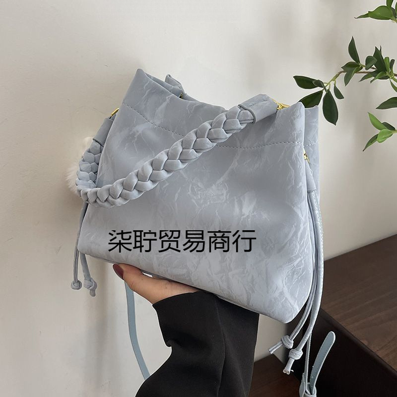 高级感洋气小众粉色包包女士新款百搭斜挎包时尚手提包水桶包|undefined