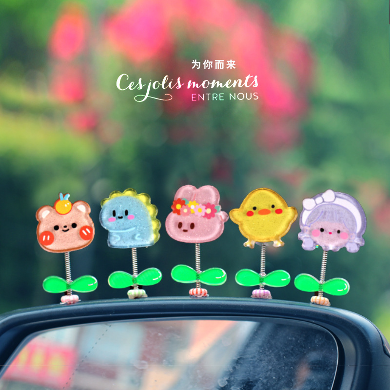 Adornos pequeños de dibujos animados lindos, decoraciones interiores de automóviles, adornos de automóviles, autos eléctricos, muñecas que sacuden la cabeza, descompresión de escritorio, celebridades de Internet