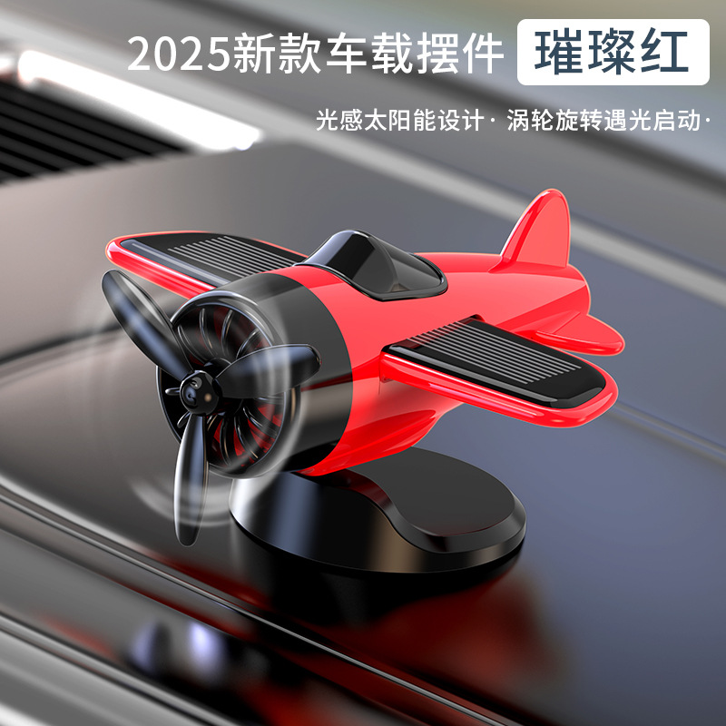 Nuevo adorno creativo de avión giratorio con energía solar para decoración del salpicadero del coche, suministros automotrices de alta gama