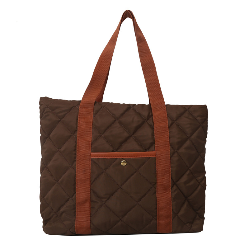 Bolsa de ropa de algodón, bolso de pluma de algodón de mujer, bolso coreano ligero 2025, nuevo estilo de aire extranjero, bolso de hombro de gran capacidad.