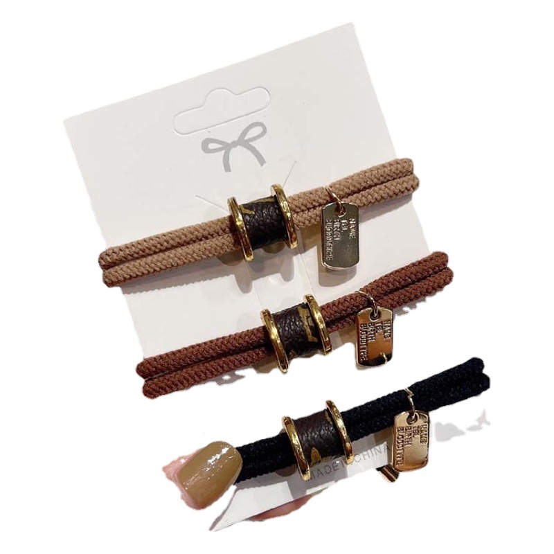 Retro cintura pequeña cuerda de pelo de las mujeres presbicia cabeza de bola de cuero anillo de pelo de doble hebra de aleación de temperamento cilíndrico cuerda de pelo accesorios para el cabello