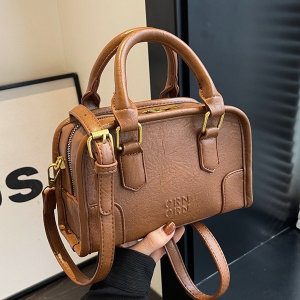 2024 New Maillard Retro Small Pillow Bag Women's Autumn and Winter Trend Korean Handheld Small Square Bag Versatile Crossbody Bag_voghion.com
