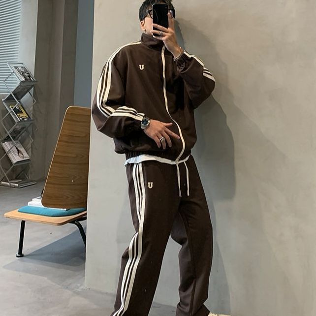 Suministro directo de fábrica 2024 primavera nueva chaqueta casual cuello alto para hombre chaqueta deportiva suelta para estudiantes de moda coreana