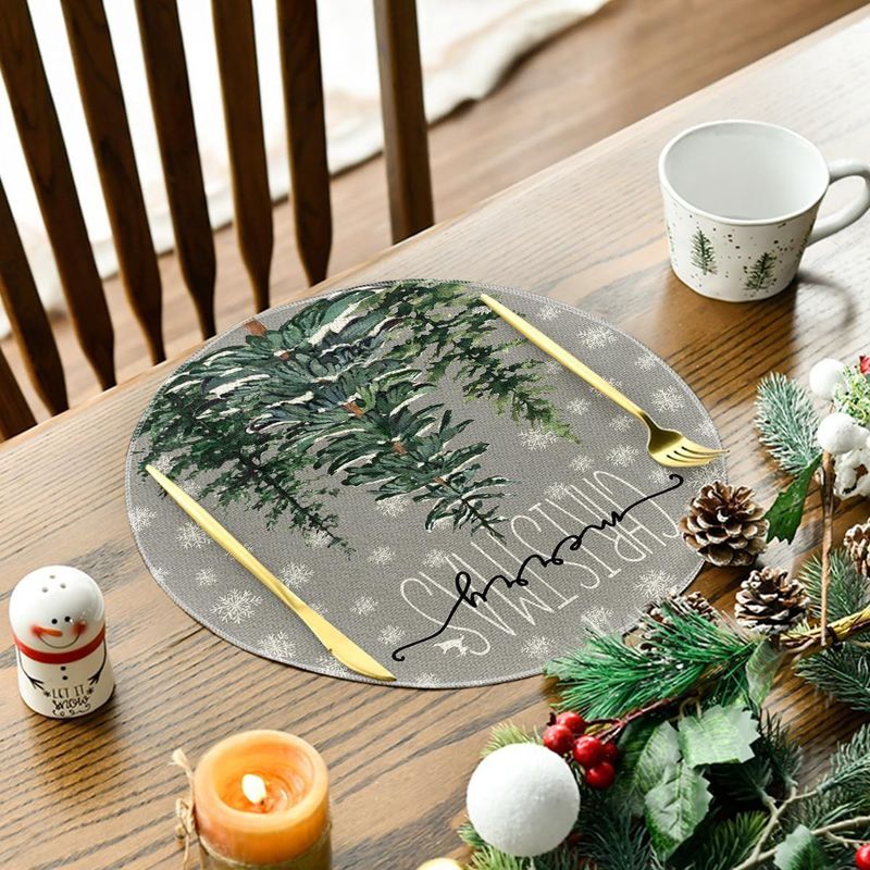 アマゾンの爆発的な祝日のクリスマスの丸い食事マットレストランの雰囲気はテーブルマットの亜麻のプリントの断熱マットの洋食を配置します。|undefined