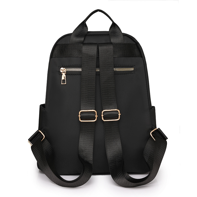 Comercio exterior al por mayor 2024 nueva versión coreana de la mochila de las señoras moda todo fósforo de gran capacidad mochila de viaje