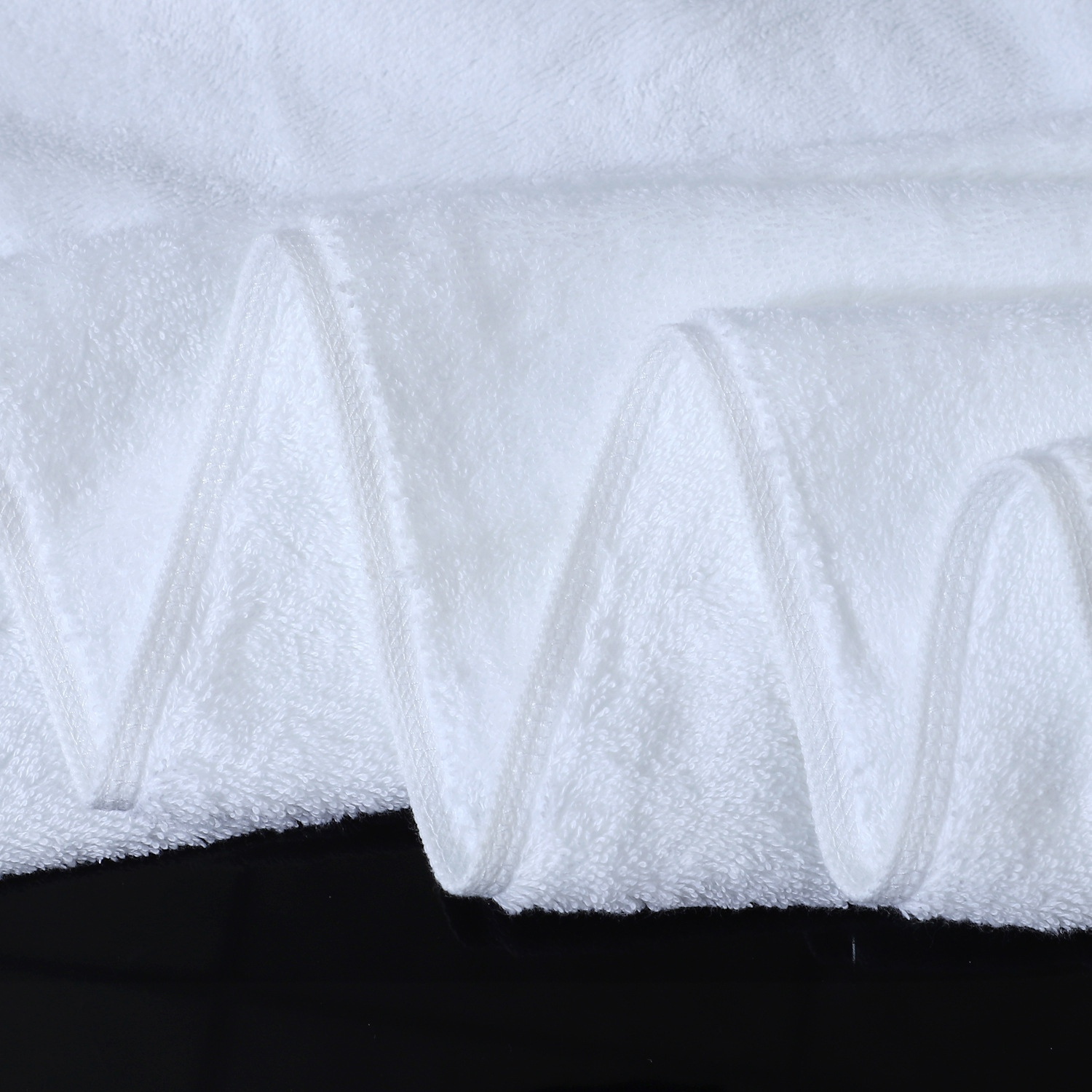 Fabricante mayorista de alta calidad hotel hotel de algodón aumentado espesar algodón silos 16 toallas de lana en espiral puede bordar palabras