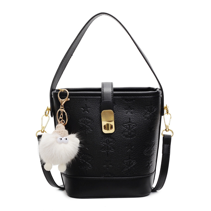 Super caliente bolso de cubo de mano mujer 2025 nueva moda relieve bolso de hombro de alta calidad humedad versátil bolso de mochila