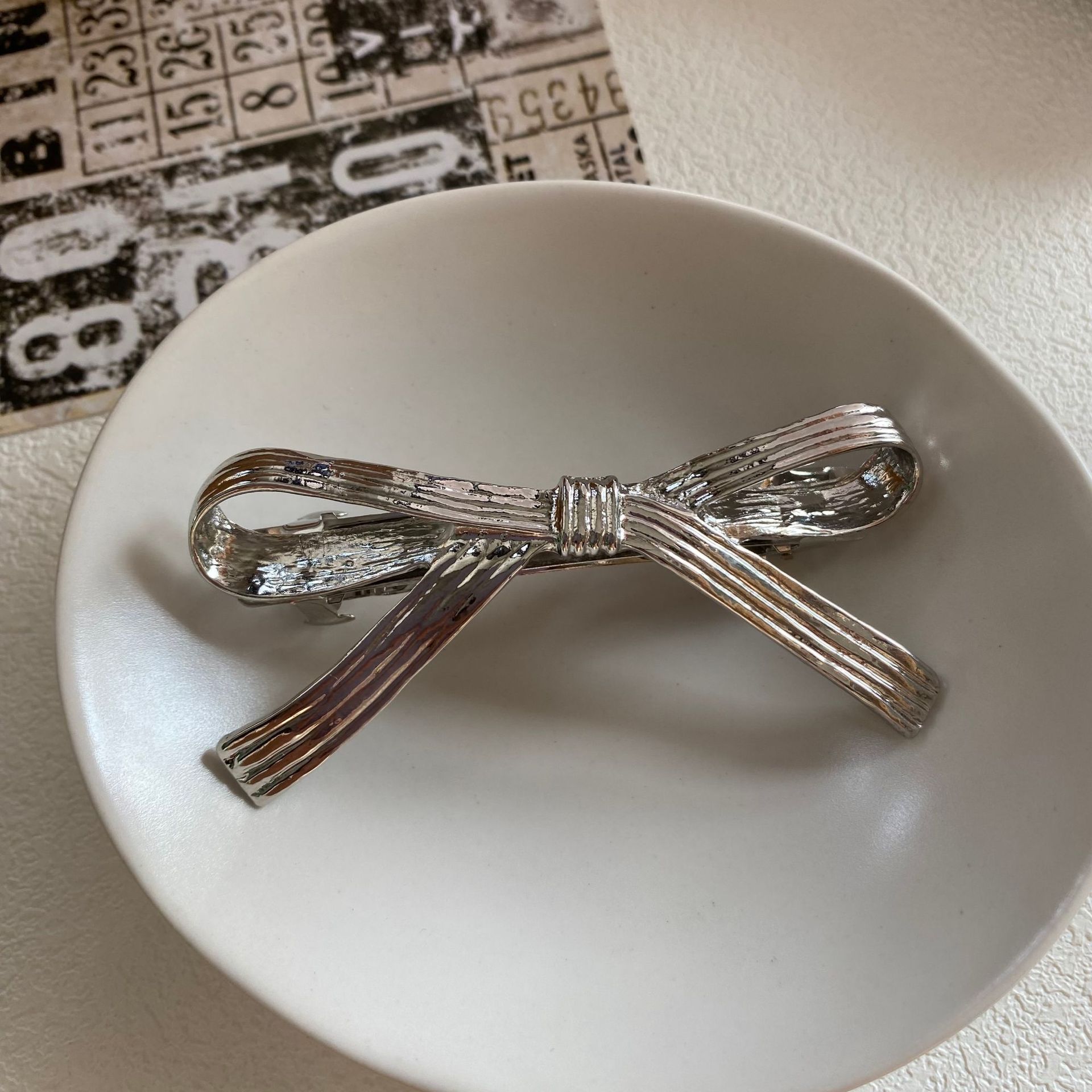 Brillo frío arco de metal simple estilo de cabello broche de mar adornamiento para el cabello coreano chica broche lateral broche broche