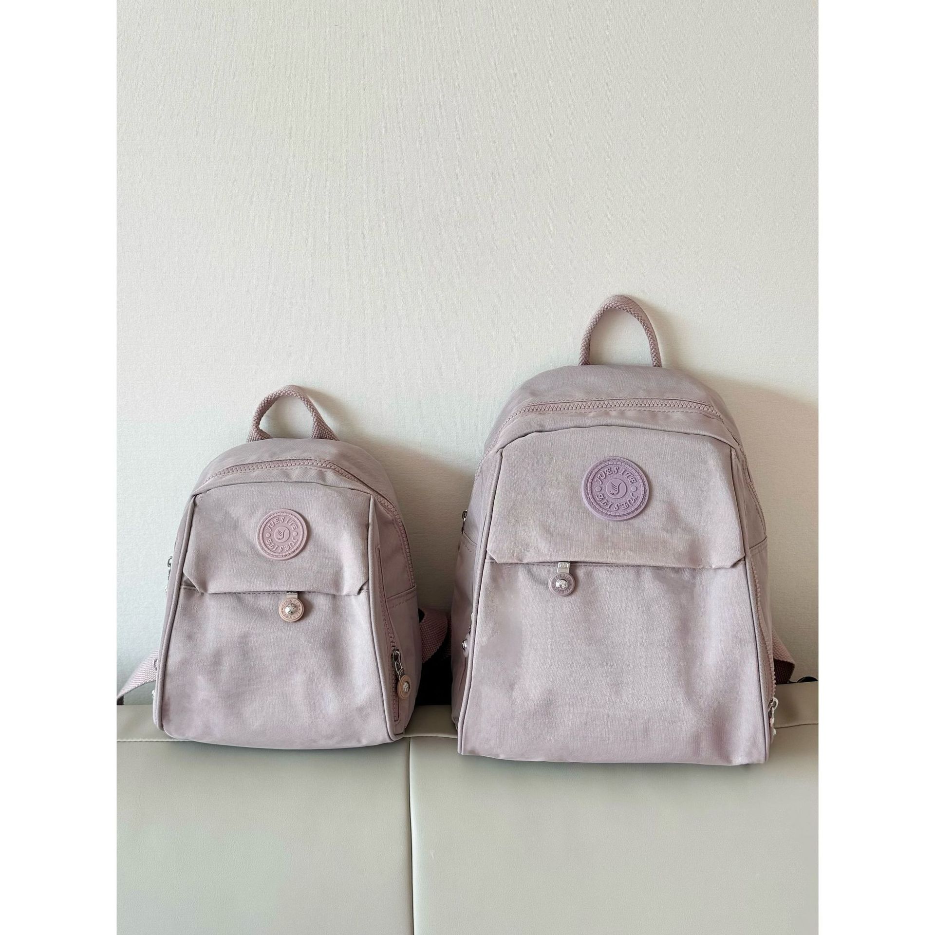 Mochila para mujer, mochila pequeña de tela Oxford de gran capacidad, resistente al agua, nueva mochila escolar de nailon lavanda de todo fósforo de moda