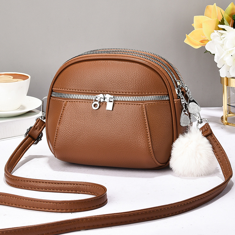 Versión coreana de varios compartimentos de alta calidad para damas bolso cuadrado pequeño bolso de hombro de moda de verano 2025 nuevo bolso de mensajero de todo fósforo