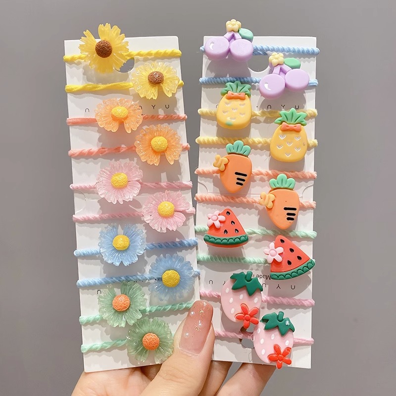 La cuerda del pelo del bebé de las muchachas de la banda de goma de los niños no lastima el pelo Los accesorios del pelo del pulgar del tamaño pequeño atan la banda de goma del pelo