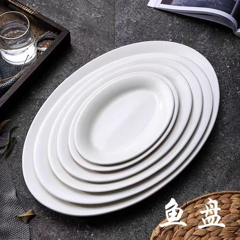 Placa de pescado blanco simple para platos de porcelana de hoteles Placa de pescado de borde grueso Placa de pescado oval grande se puede usar en microondas